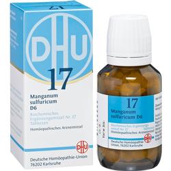 Eine blaue Schachtel und eine braune Flasche eines homöopathischen Mittels stehen nebeneinander.