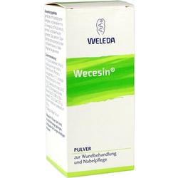 Weiße Schachtel mit grüner Aufschrift "Wecesin", ein Pulver für Wunden und Nabelpflege.